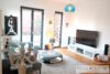 REAL HOUSE: Exklusive 2 Zi. Wohnung mit großzügiger Terrasse und TG-Stellplatz in Braunsfeld - Wohnbereich
